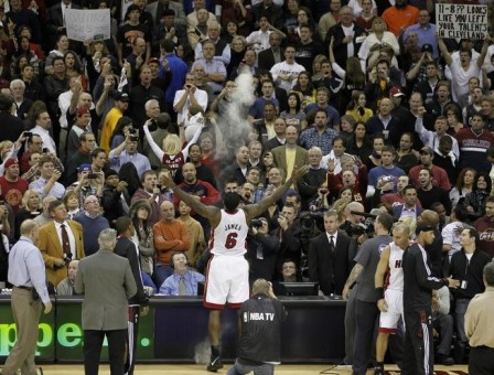 Lebron throws powder in the air prior to playing the Cleveland