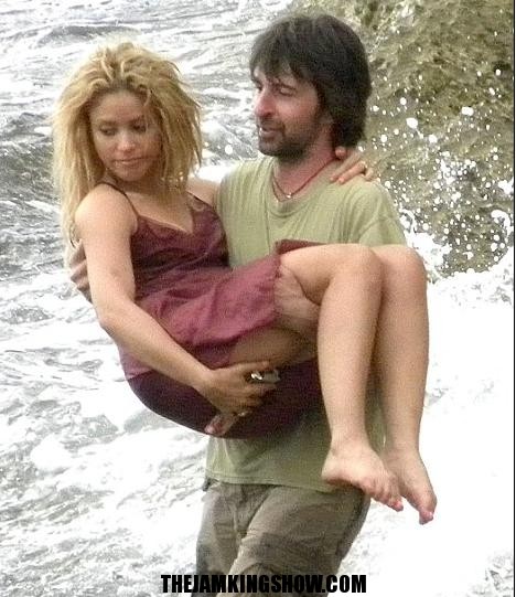 Soggy Shakira gets carried away on wet and windy beach photo shoot