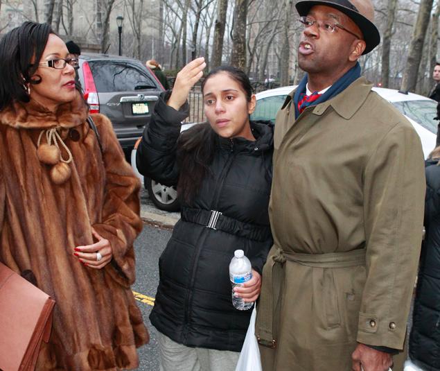 Correction Officer Nancy Gonzalez (center), 29, who is accused of having sex with an inmate and who's having his child, leaves Brooklyn Federal Court located at 225 Cadman Plaza in Brooklyn, New York on Tuesday, February 5. 